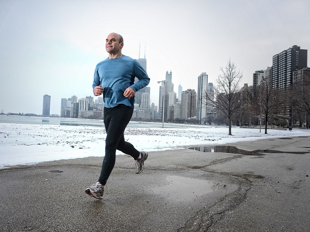 person running in a park for weight loss