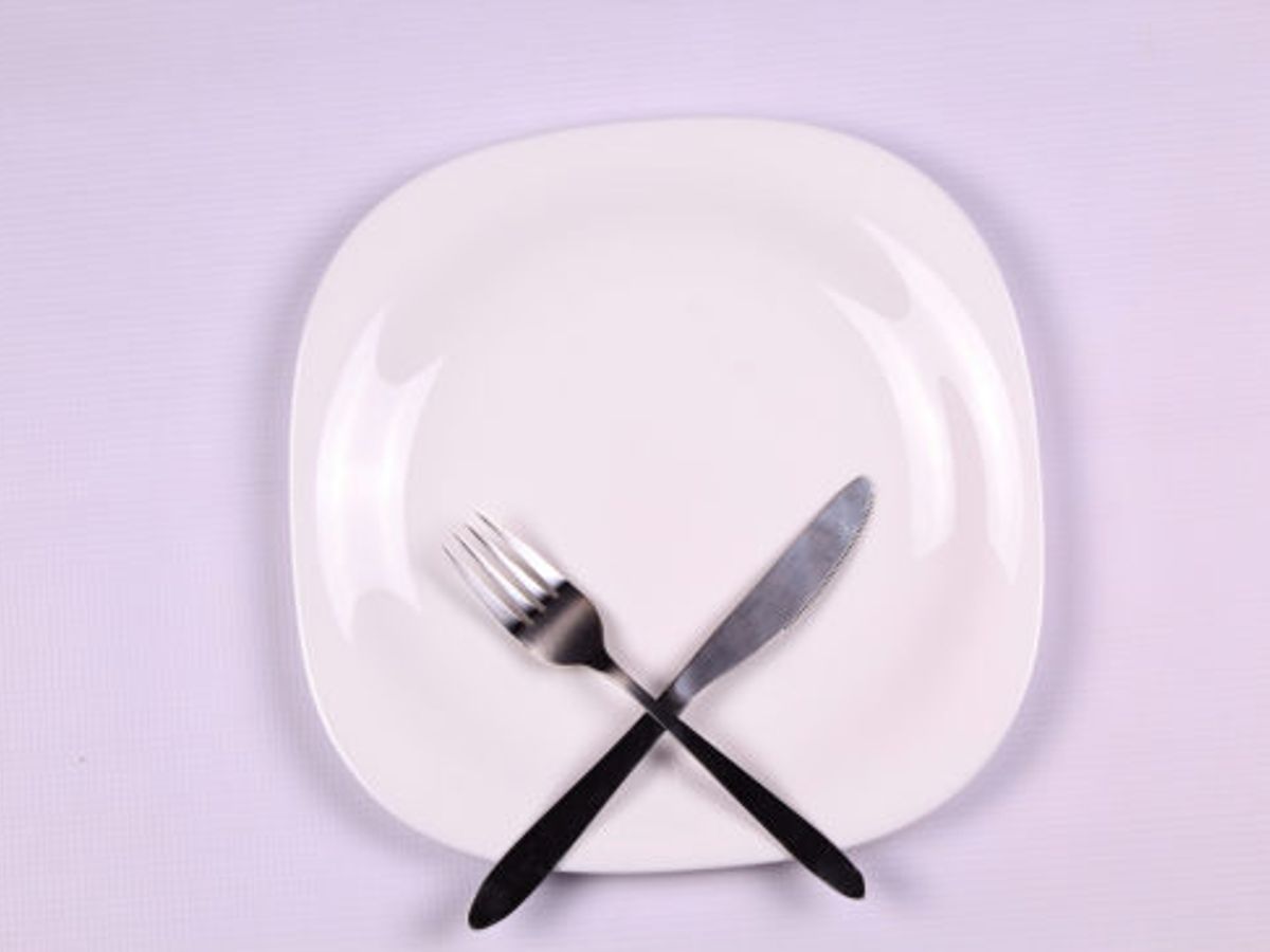 person skipping a meal, weight loss concept